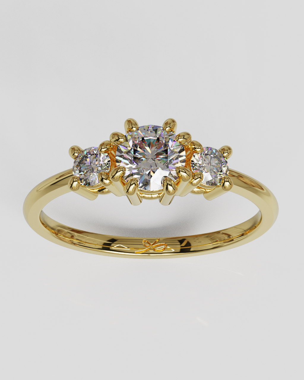 Anillo Tresillo oro amarillo 18K
